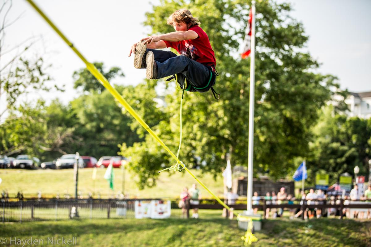 Mickey Wilson jumps on a slackline